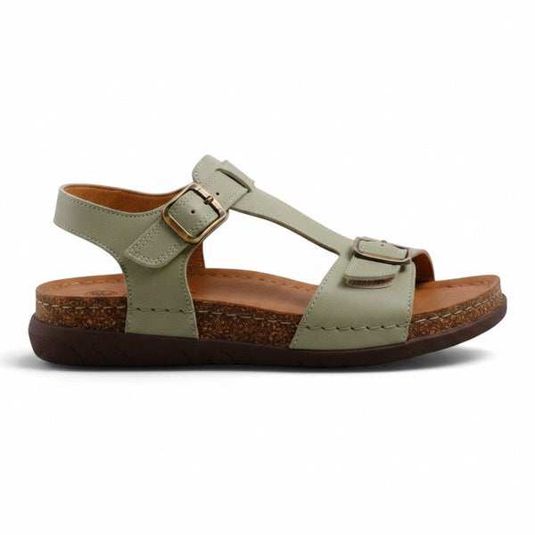 Step Ahead Pesso Beau sage green leather sandal with adjustable straps, padded footbed, and cork-style midsole.