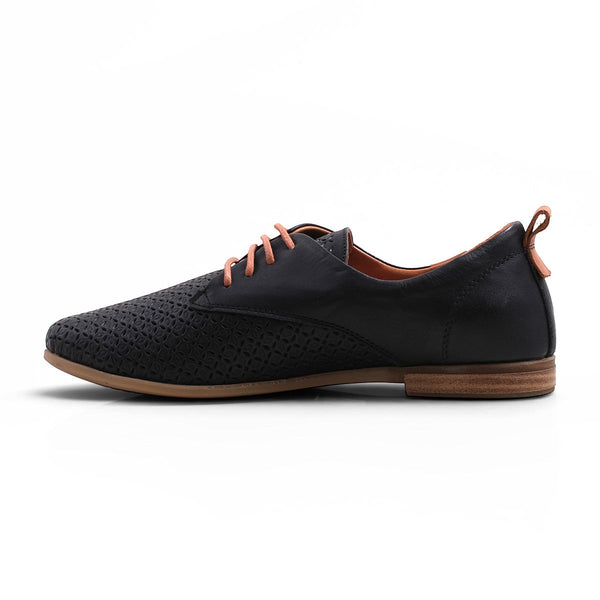 Step Ahead Pesso Aggie black leather brogue loafer with perforated detailing, tan laces, and a flexible rubber sole.