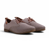 Step Ahead Pesso Aggie grey leather brogue loafers with laser-cut detailing, brown laces, and a flexible rubber sole.