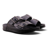 Step Ahead Pesso men's all-black leather slide sandals with dual adjustable buckle straps and a contoured footbed.