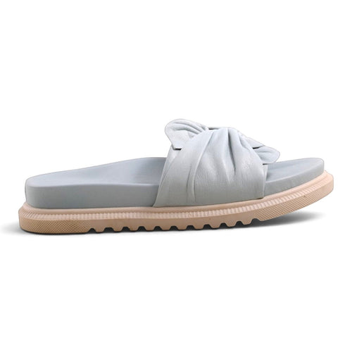 Step Ahead Pesso Borgan Aqua slide sandal featuring a soft light blue leather upper with a gathered bow detail.