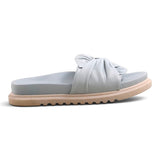 Step Ahead Pesso Borgan Aqua slide sandal featuring a soft light blue leather upper with a gathered bow detail.