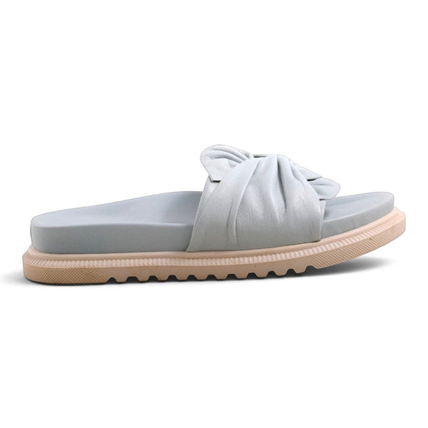 Step Ahead Pesso Borgan Aqua slide sandal featuring a soft light blue leather upper with a gathered bow detail.