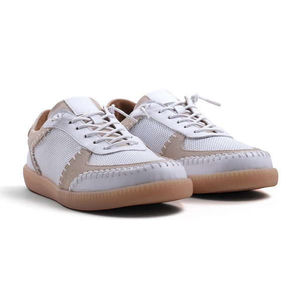 Step Ahead Pesso Penelope white leather and suede sneakers with intricate stitching and a caramel rubber sole.