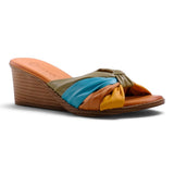 Step Ahead Pesso Tarin wedge sandals featuring a multi-coloured knotted leather strap in yellow, blue, and olive.